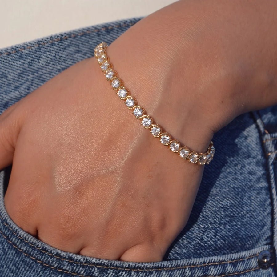 S-Link tennis bracelet in 18K gold on wrist